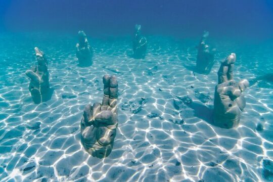 Top Isla Mujeres Catamaran Tour with Snorkel Open Bar and Buffet lunch